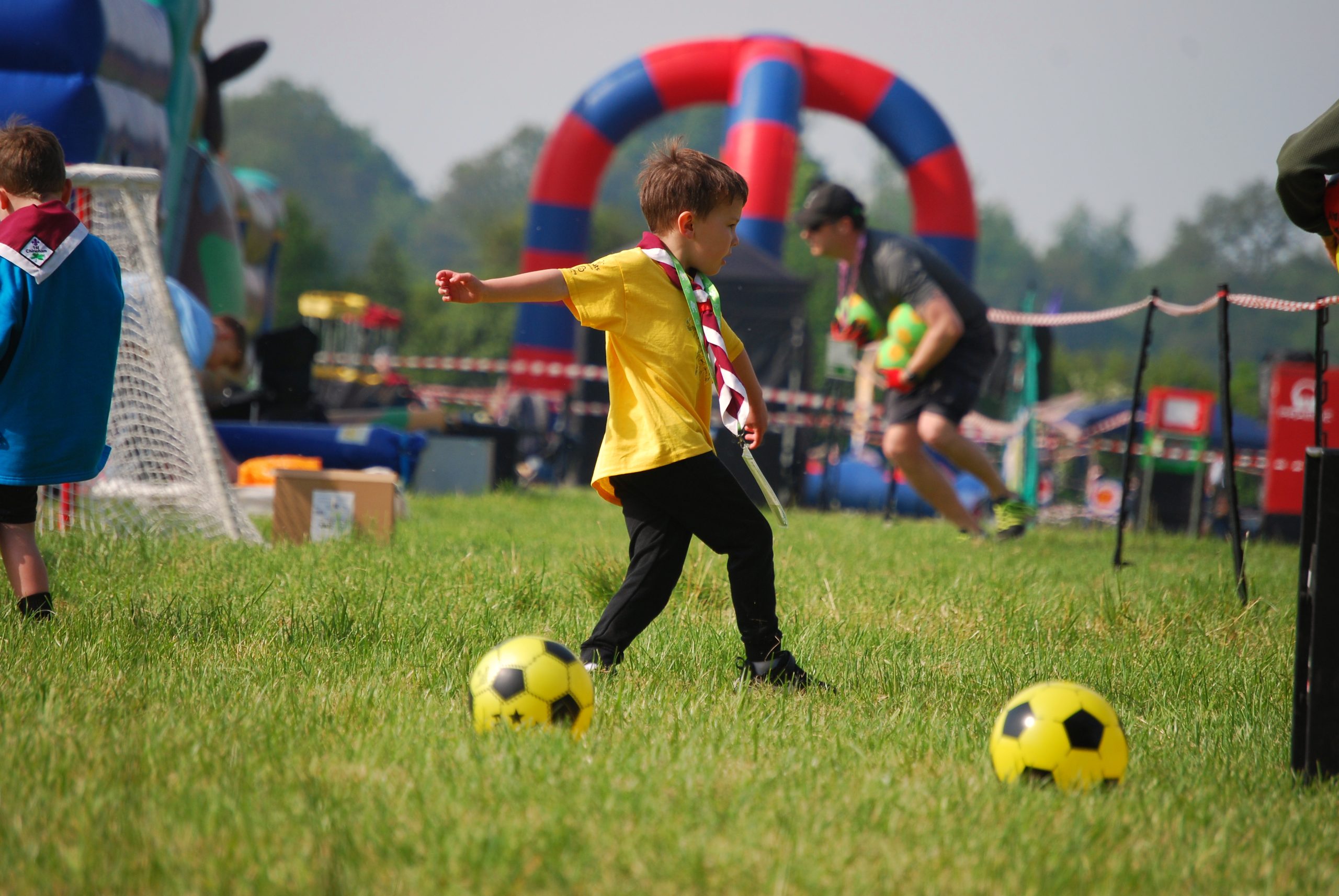 A young person enjoying football at BEASTLY